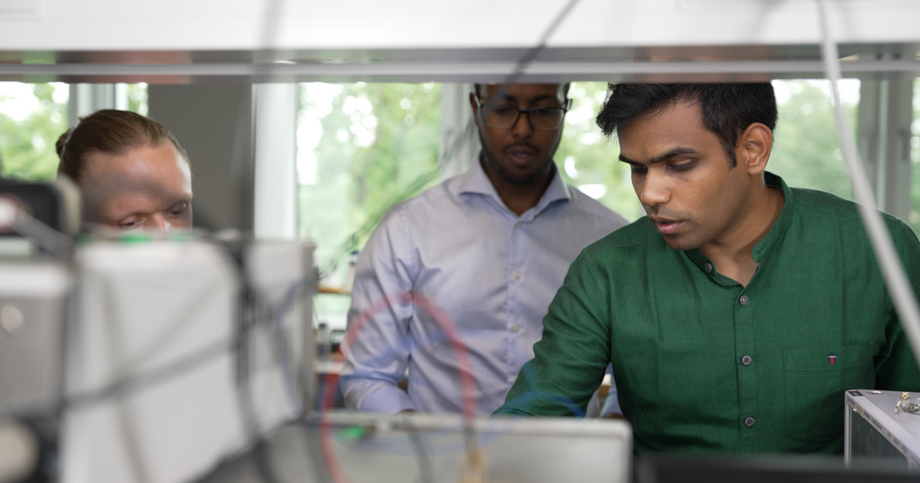 Men looking at a PC